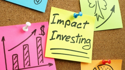 Postits mit dem Namen Impact Investing