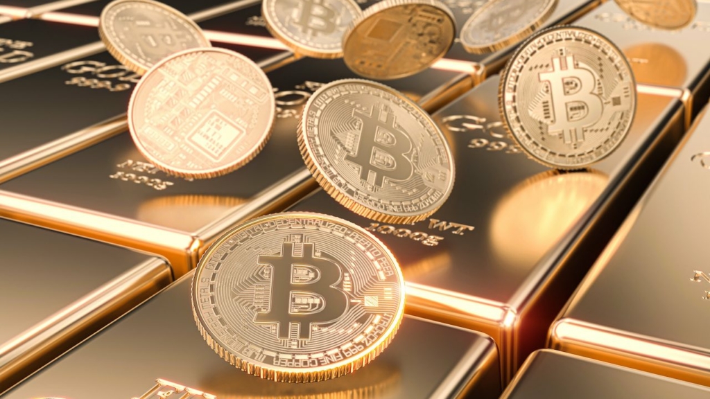 Goldbarren und Bitcoin-Münzen