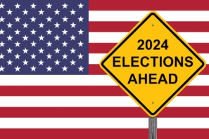 Wahlen 2024 vor dem Hintergrund amerikanischer Flagge